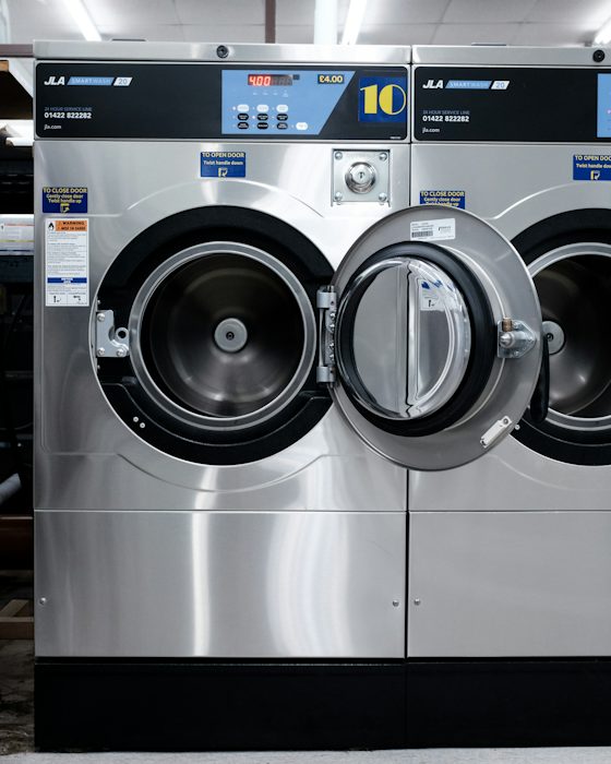 Row of front-loading washing machines